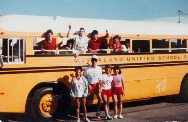 The team with coach Jim White on the day of the impromptu trip to the beach. Silvia is in the pink shirt. Dolores Plata Rodriguez says the bus trips were the most fun of her cross country experience. Now, nearly 30 years later, Norma Lopez Takahashi gives a little taste of what they were like: "The movie made the boys look so tough. Heck, we girls could have beat them up," she says, delivering a good-natured salvo to her former teammates. Photo courtesy Flora Diaz and Raul Diaz
